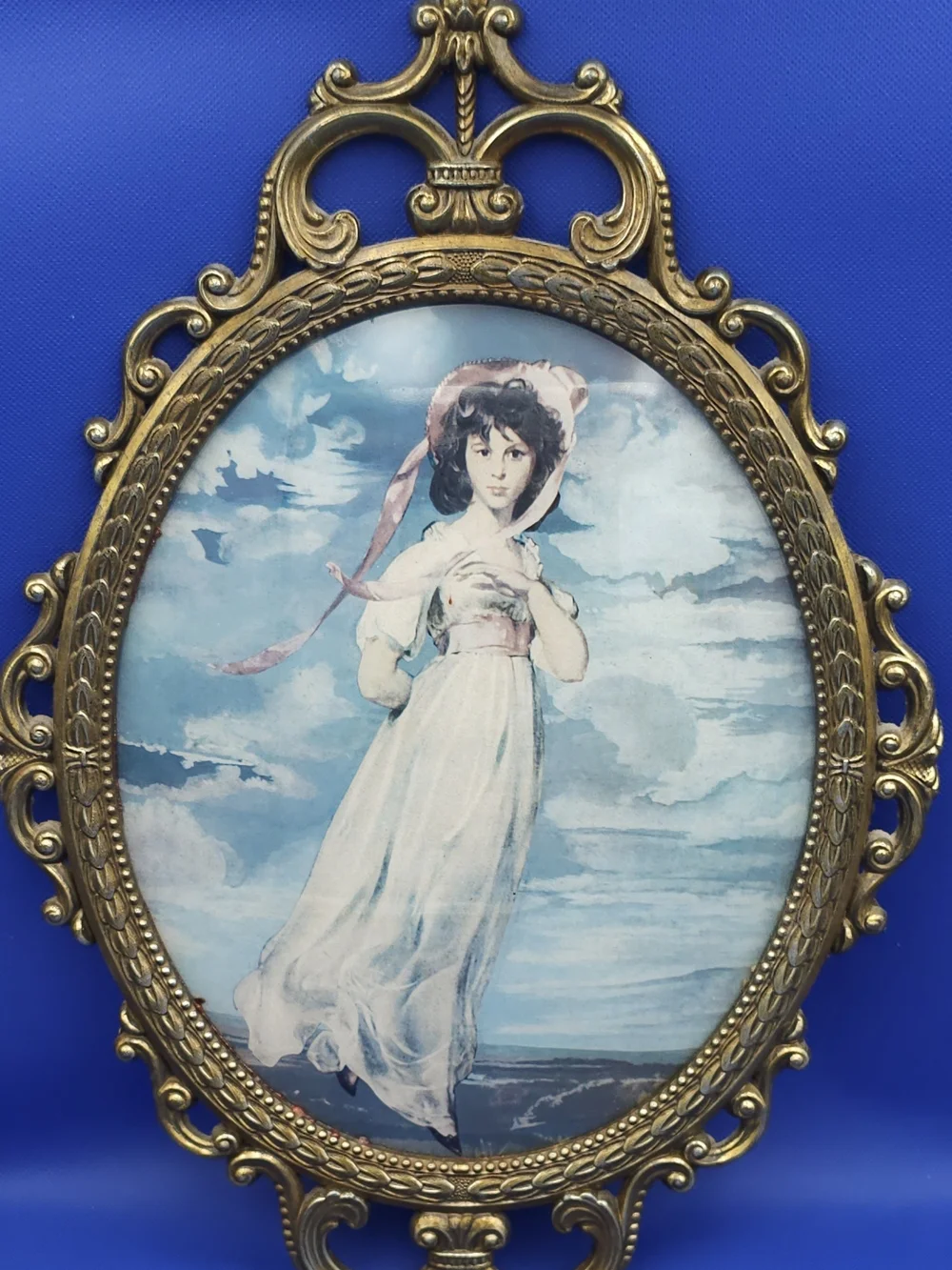 Ornate Gold Oval Wall Frame with Blue Artwork